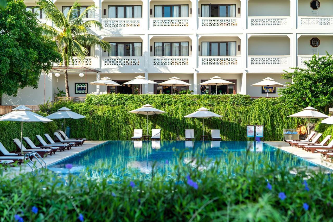 Rivertown Hoi An Resort & Spa Bagian luar foto The hotel's swimming pool