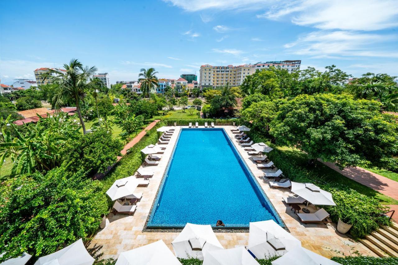 Rivertown Hoi An Resort & Spa Bagian luar foto The pool at the hotel