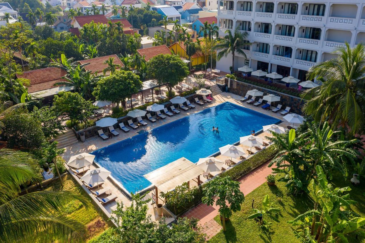 Rivertown Hoi An Resort & Spa Bagian luar foto The hotel's swimming pool