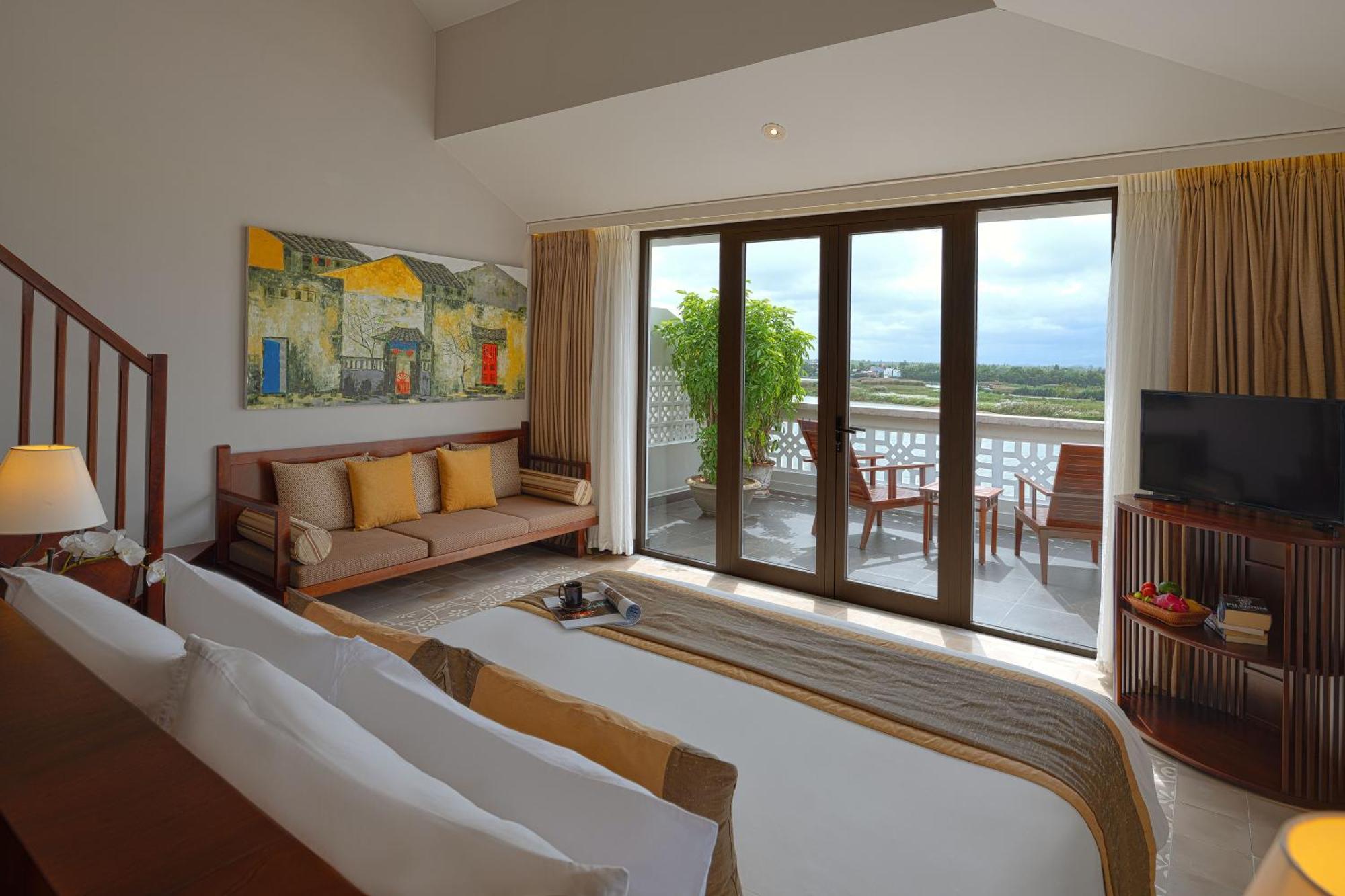 Rivertown Hoi An Resort & Spa Bagian luar foto A suite at the Taj Bengal
